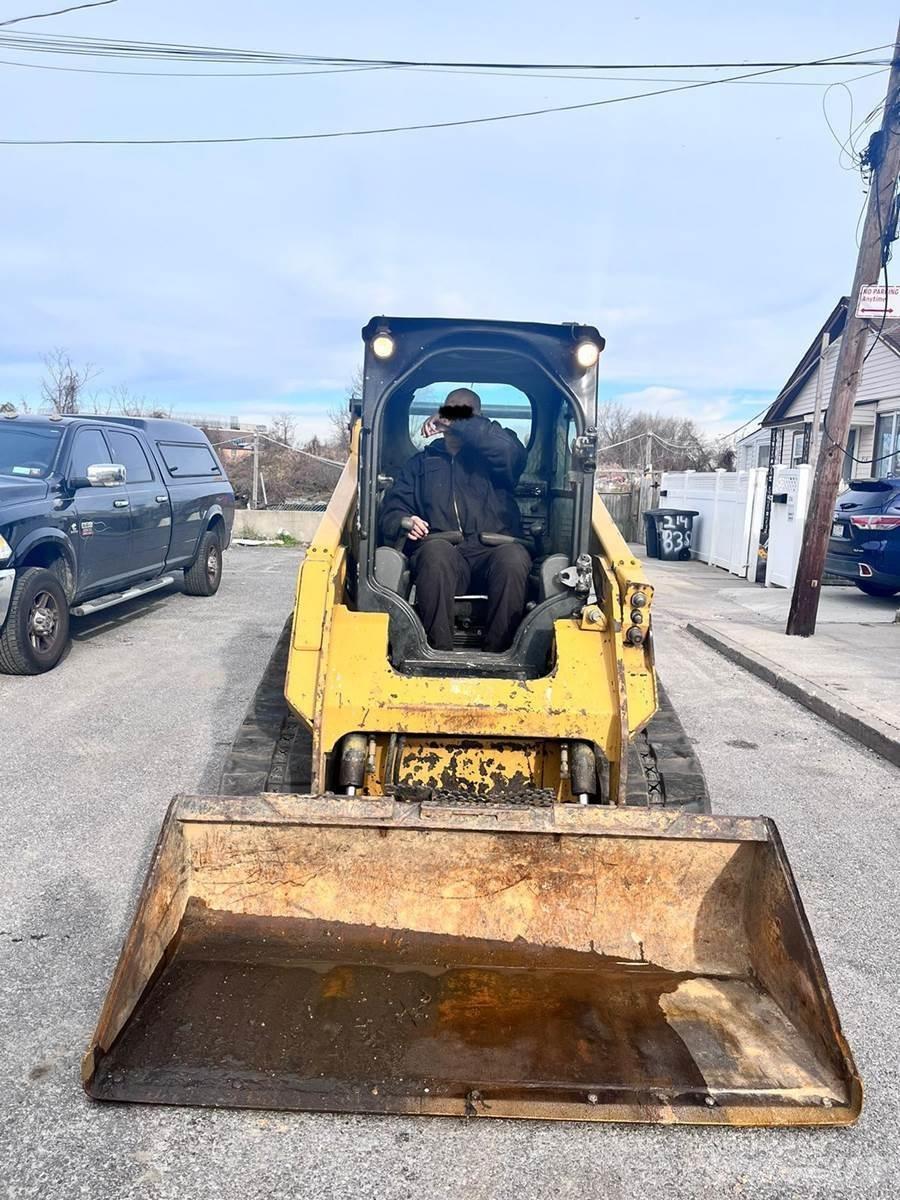 CAT 259D Mini Pale Gommate