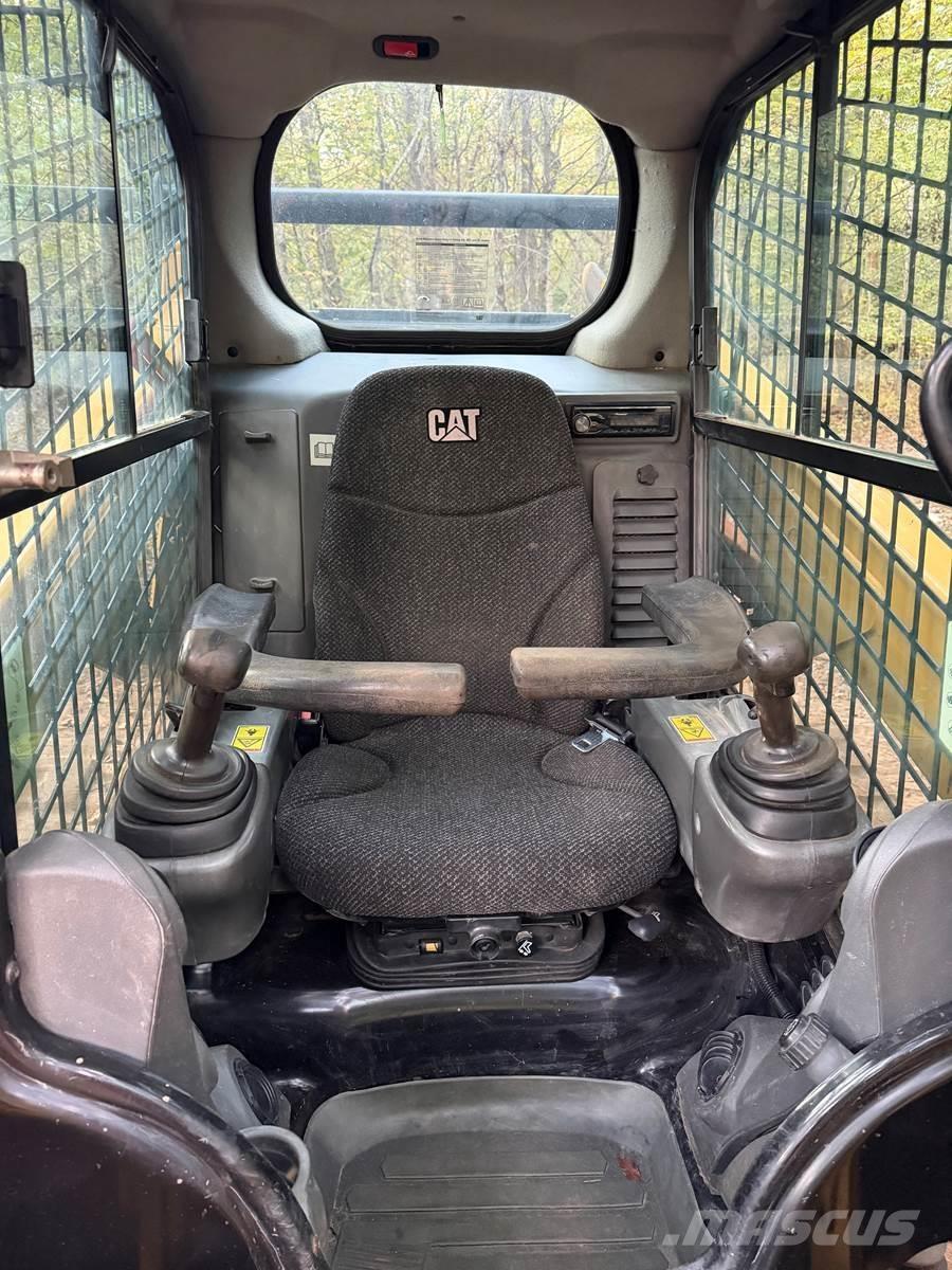 CAT 259D Mini Pale Gommate