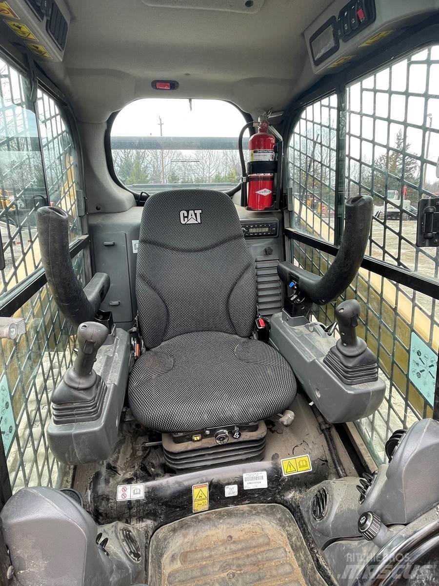 CAT 259D3 Mini Pale Gommate