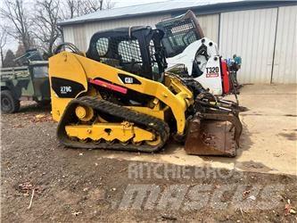 CAT 279C Mini Pale Gommate