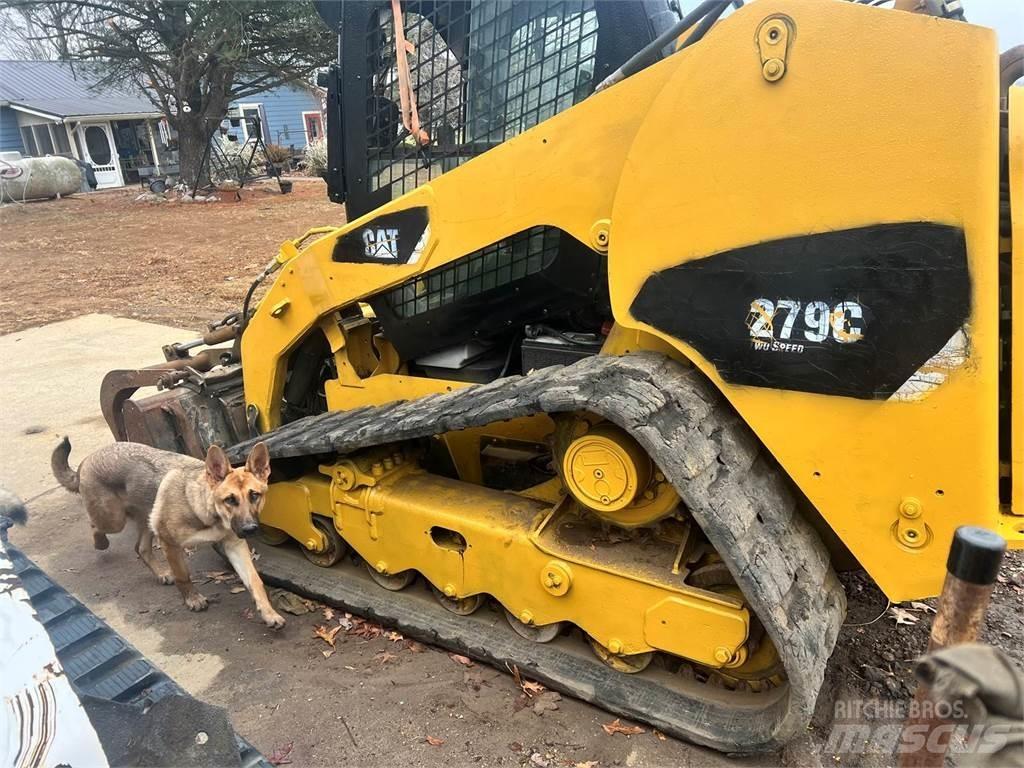 CAT 279C Mini Pale Gommate