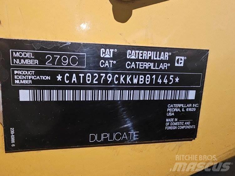 CAT 279C Mini Pale Gommate