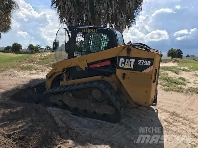 CAT 279D Mini Pale Gommate