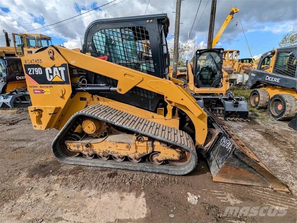 CAT 279D Mini Pale Gommate