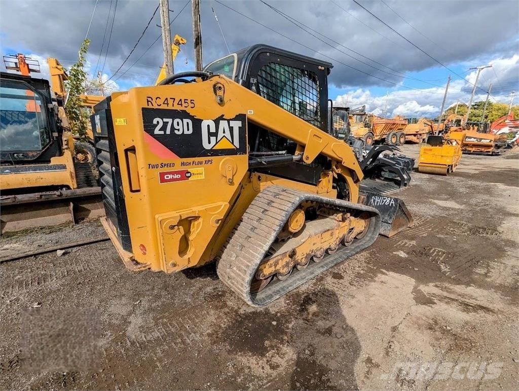 CAT 279D Mini Pale Gommate