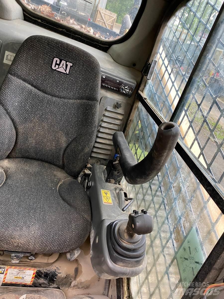 CAT 287D Mini Pale Gommate