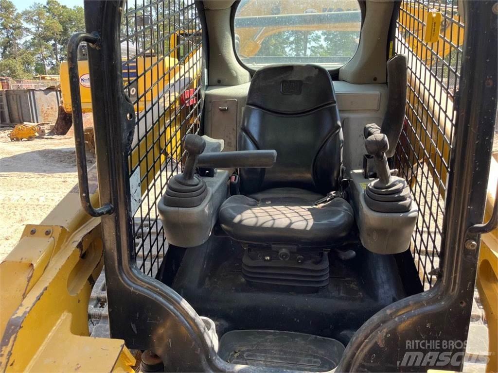 CAT 289D Mini Pale Gommate
