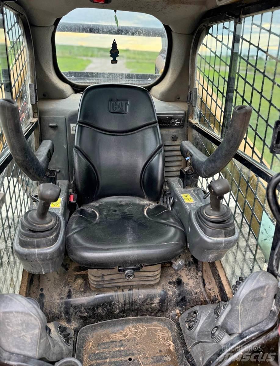 CAT 289D Mini Pale Gommate