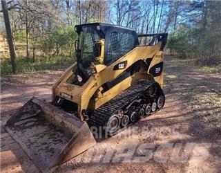 CAT 297C Mini Pale Gommate