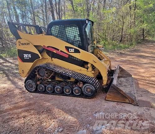 CAT 297C Mini Pale Gommate