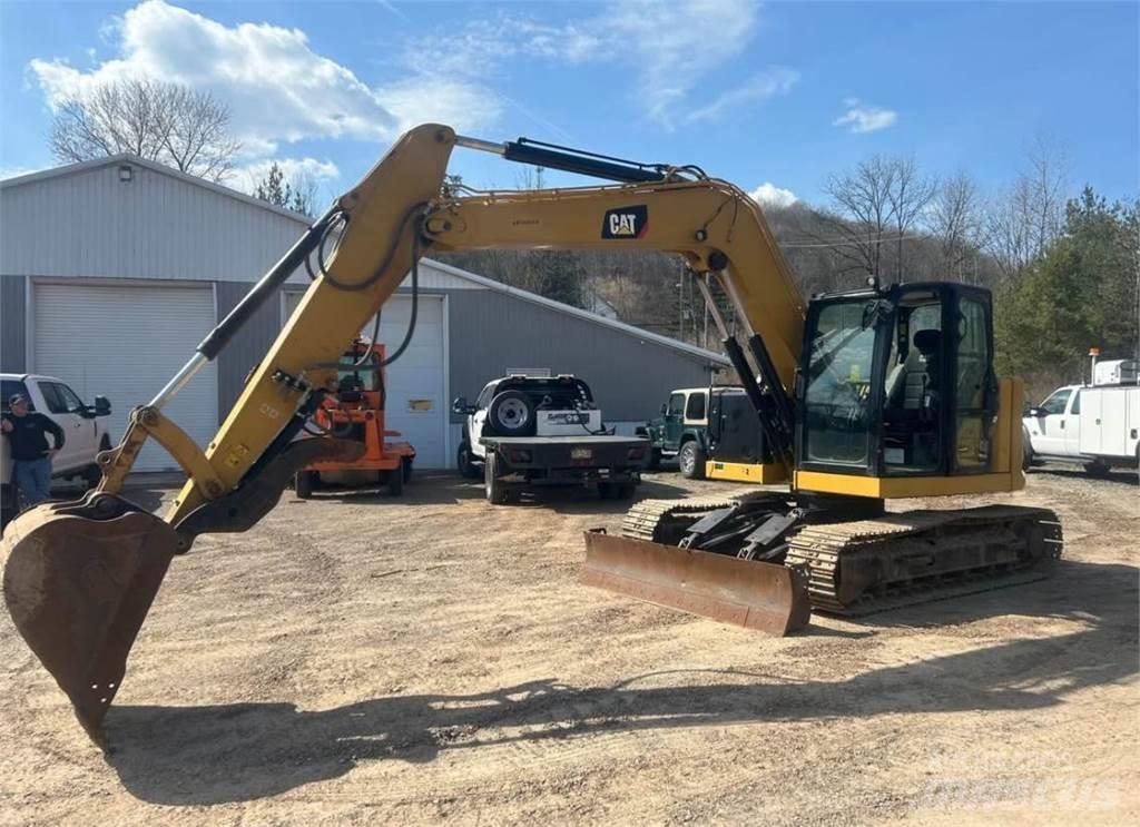 CAT 310 Miniescavatori