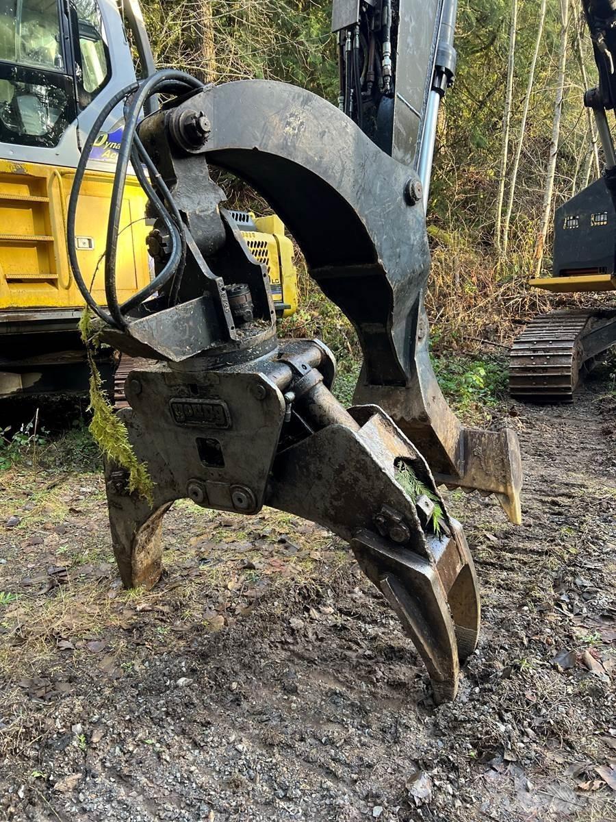 CAT 325BL Caricatronchi con base su rimorchio