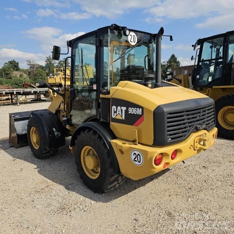 CAT 906M Pale gommate