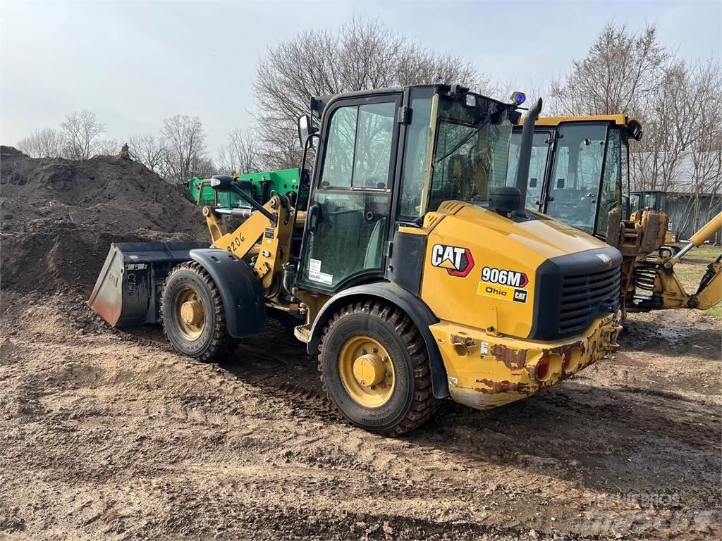 CAT 906M Pale gommate