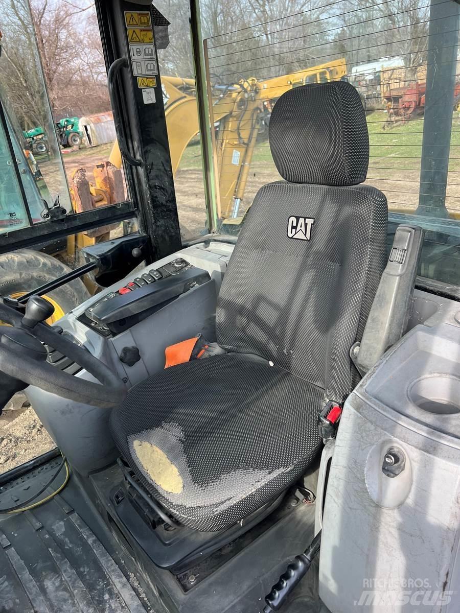 CAT 906M Pale gommate