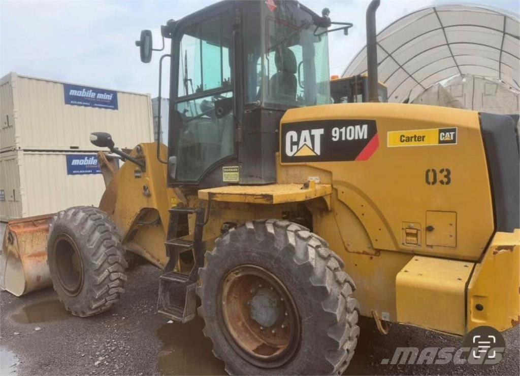 CAT 910M Pale gommate