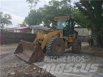 CAT 928G Pale gommate