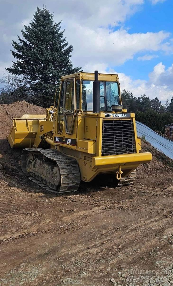 CAT 963 Pale cingolate