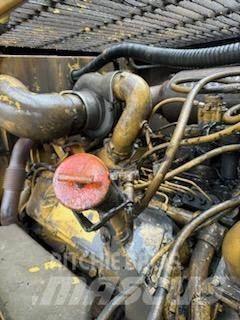 CAT 988F Pale gommate