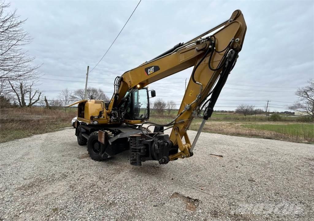 CAT M313D Escavatori gommati