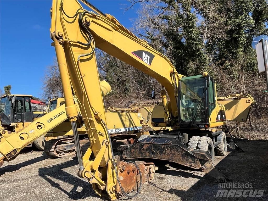 CAT M318C Escavatori gommati