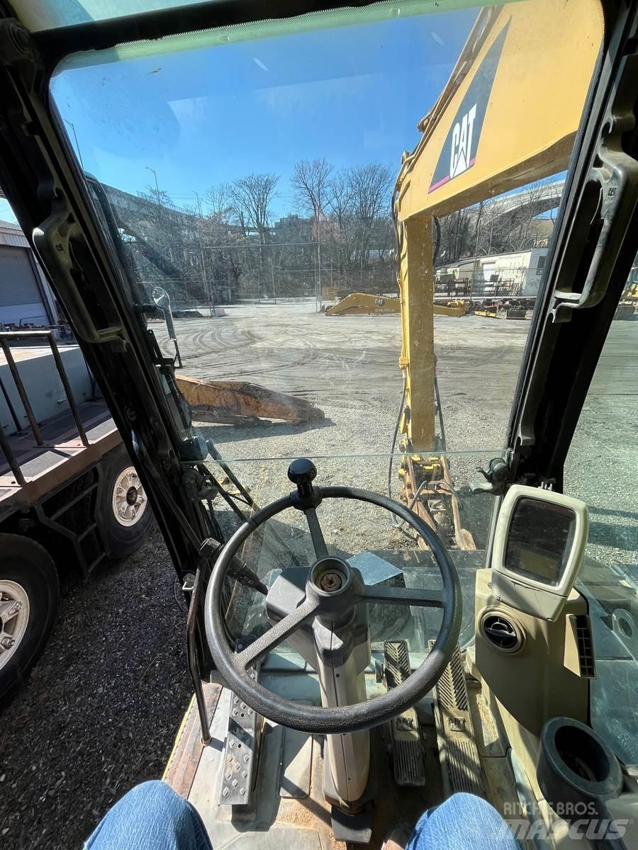 CAT M318C Escavatori gommati