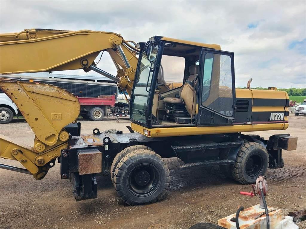 CAT M320 Escavatori gommati