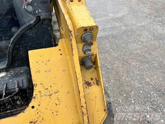 CAT 259D Mini Pale Gommate