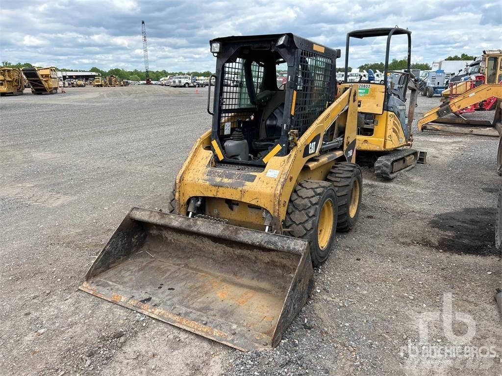 CAT 216B2 Mini Pale Gommate
