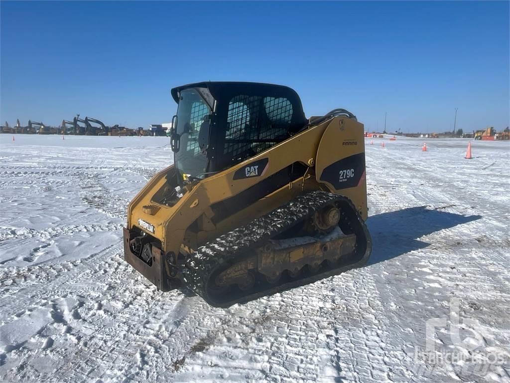 CAT 279C Mini Pale Gommate