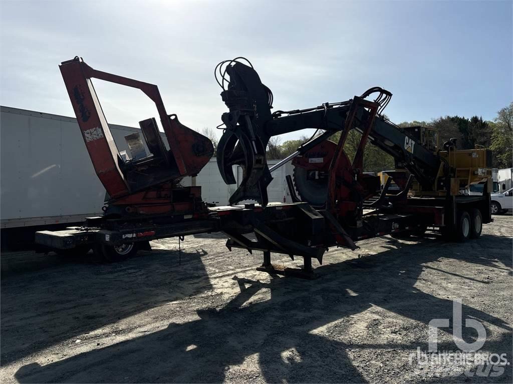 CAT 559 Caricatronchi con base su rimorchio