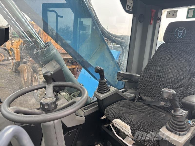 Fuchs MHL320 Movimentazione rifiuti