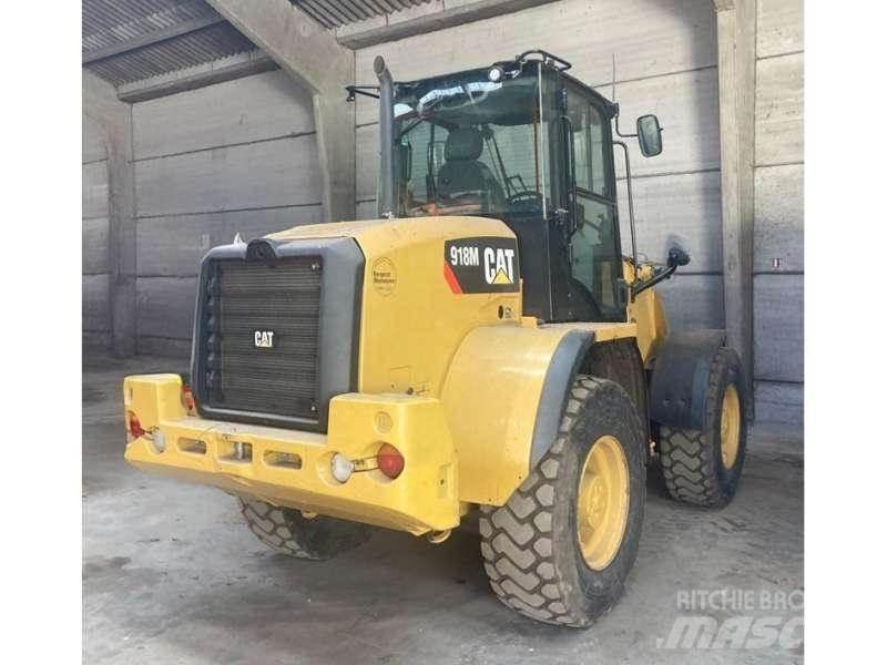 CAT 918M Pale gommate
