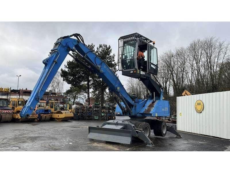 Fuchs MHL320 Movimentazione rifiuti