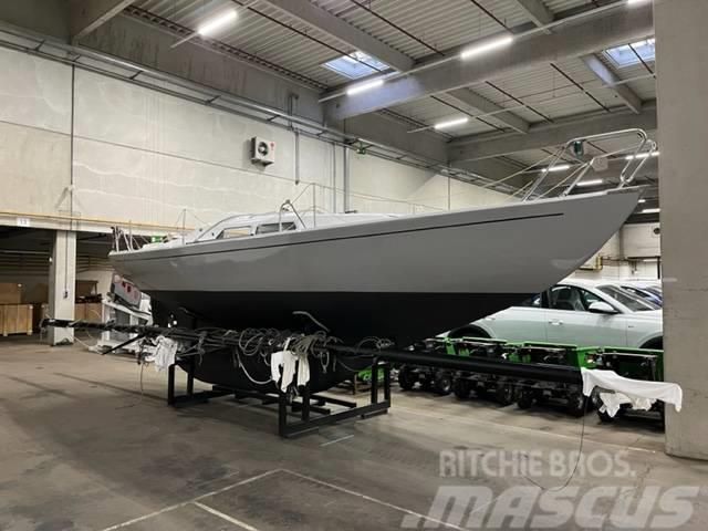 Volvo L90M  Marieholm IF26 classic sailingyacht Pale gommate