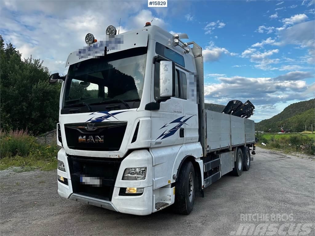 MAN TGX 26.560 Flatbed truck with Hiab 138 crane from  Camion con sponde ribaltabili