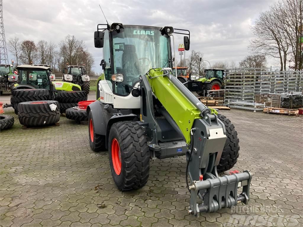CLAAS Torion 738 T SINUS Pale gommate