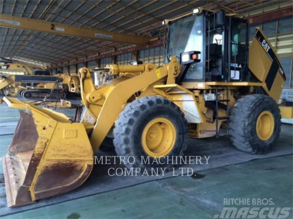 CAT 938G Pale gommate