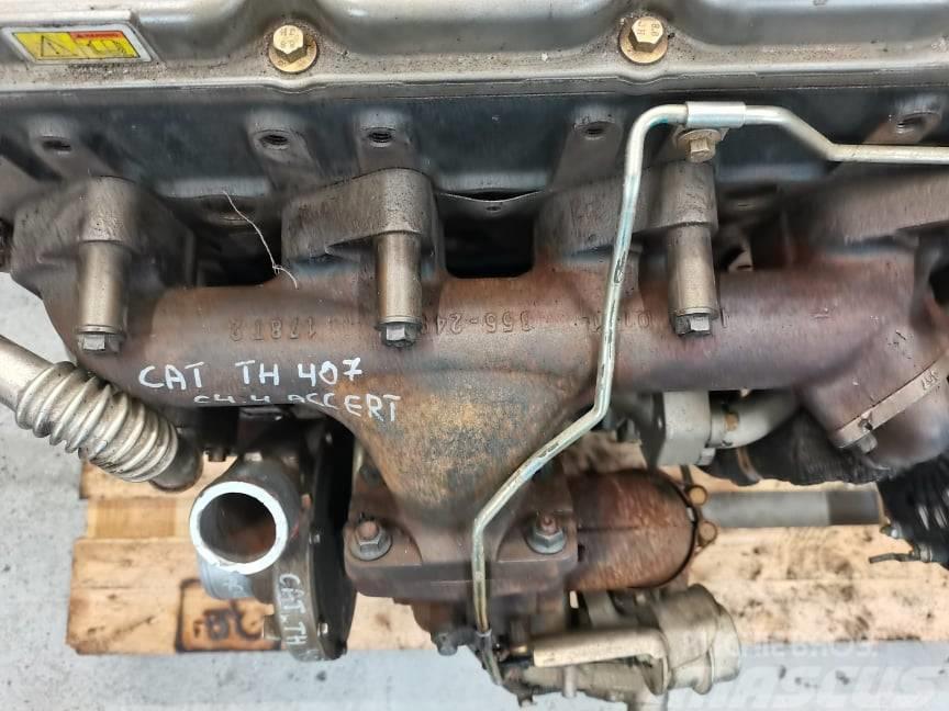 CAT TH 407 {exhaust manifold CAT C4.4 Accert} Motori