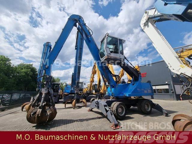 Fuchs MHL 331 / ZSA / AC / Hochfahrbare Kabine /Magnet Escavatori gommati