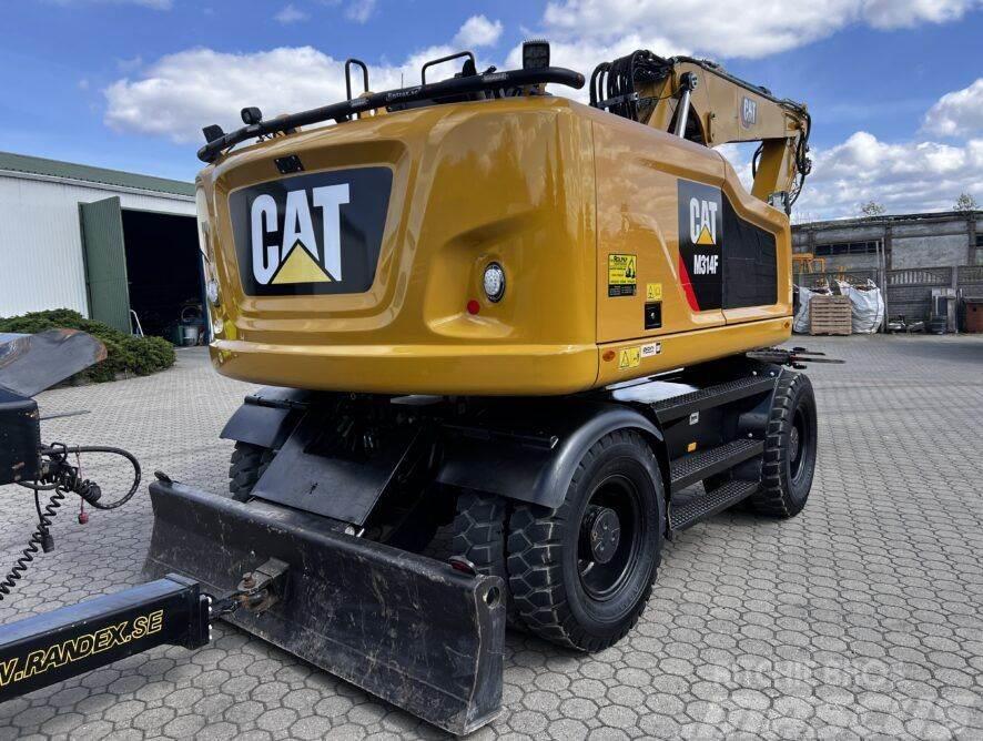 CAT M314F + trailer Randex + Rototilt Escavatori gommati